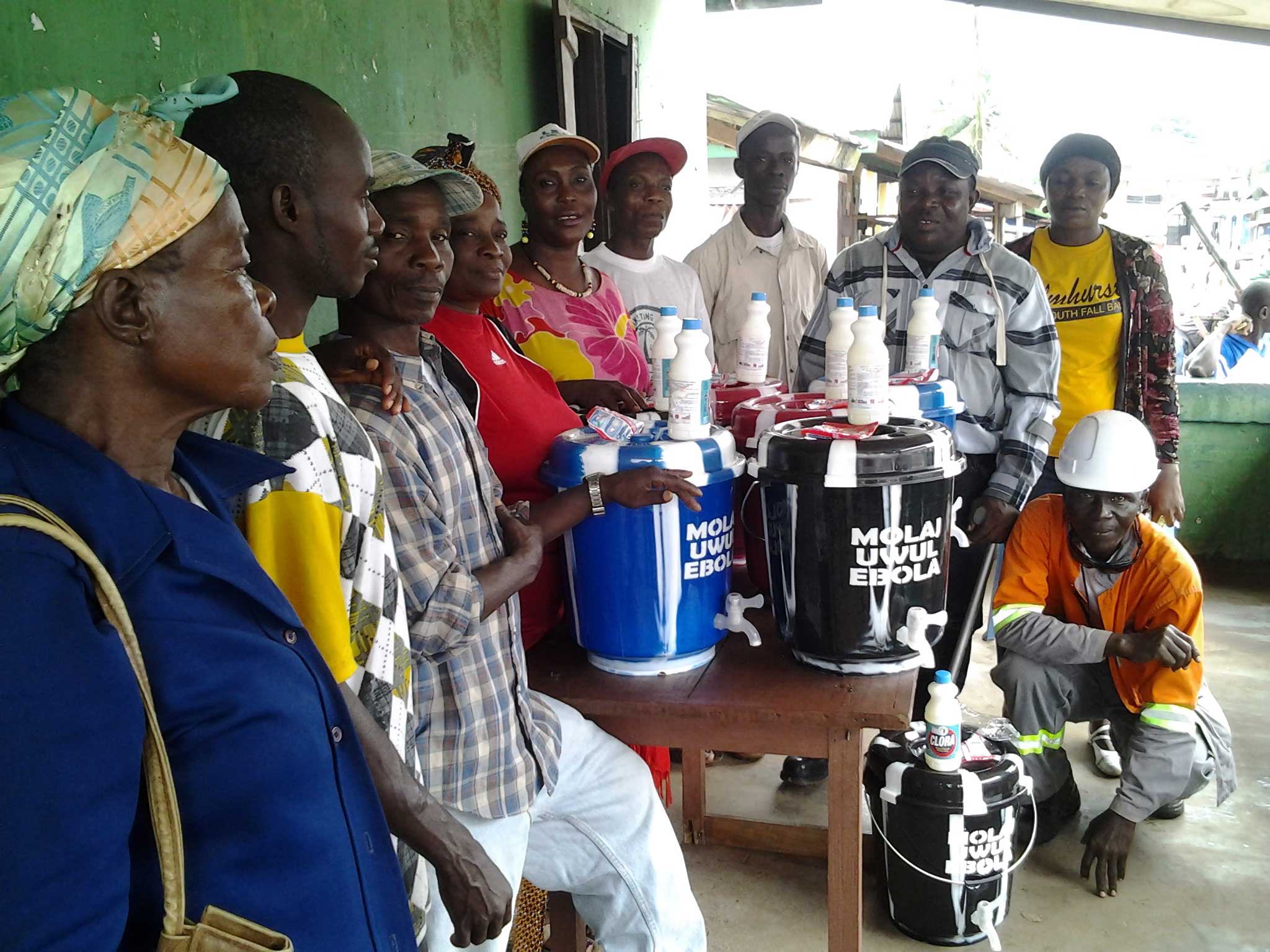 Union members are distributing buckets of chlorine to workers around Liberia.