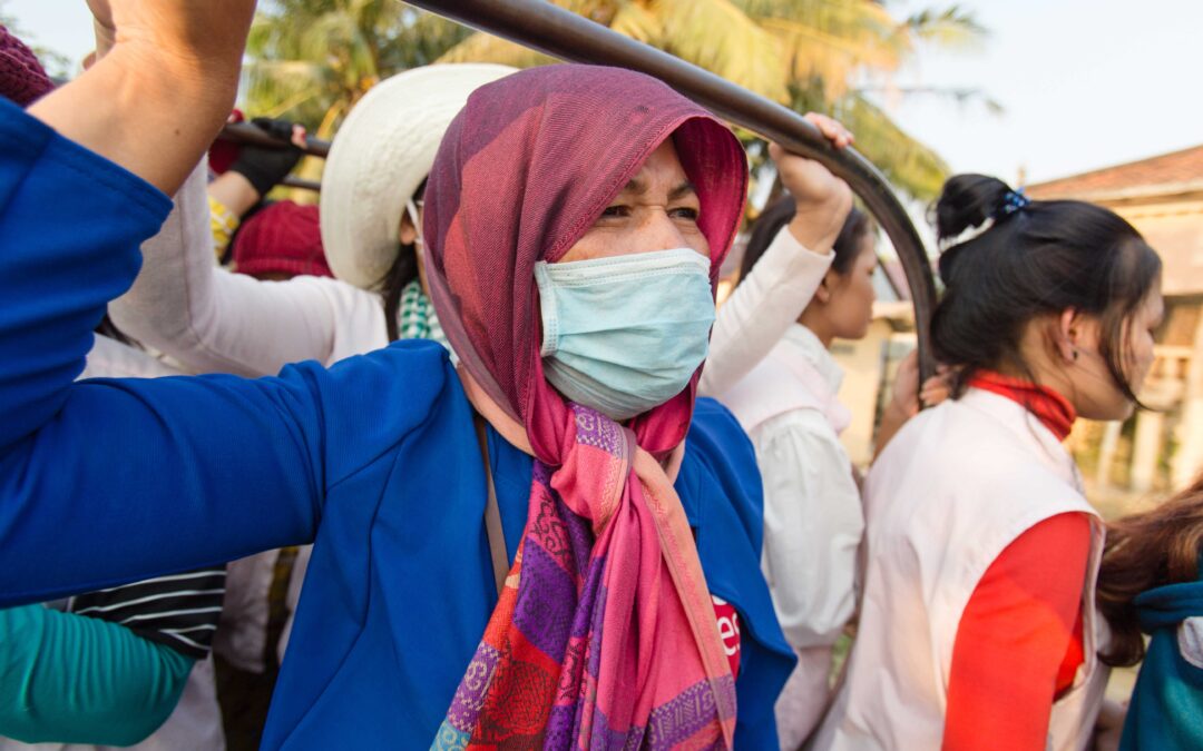 Cambodia, garment workers on transport to work, worker rights, Solidarity Center